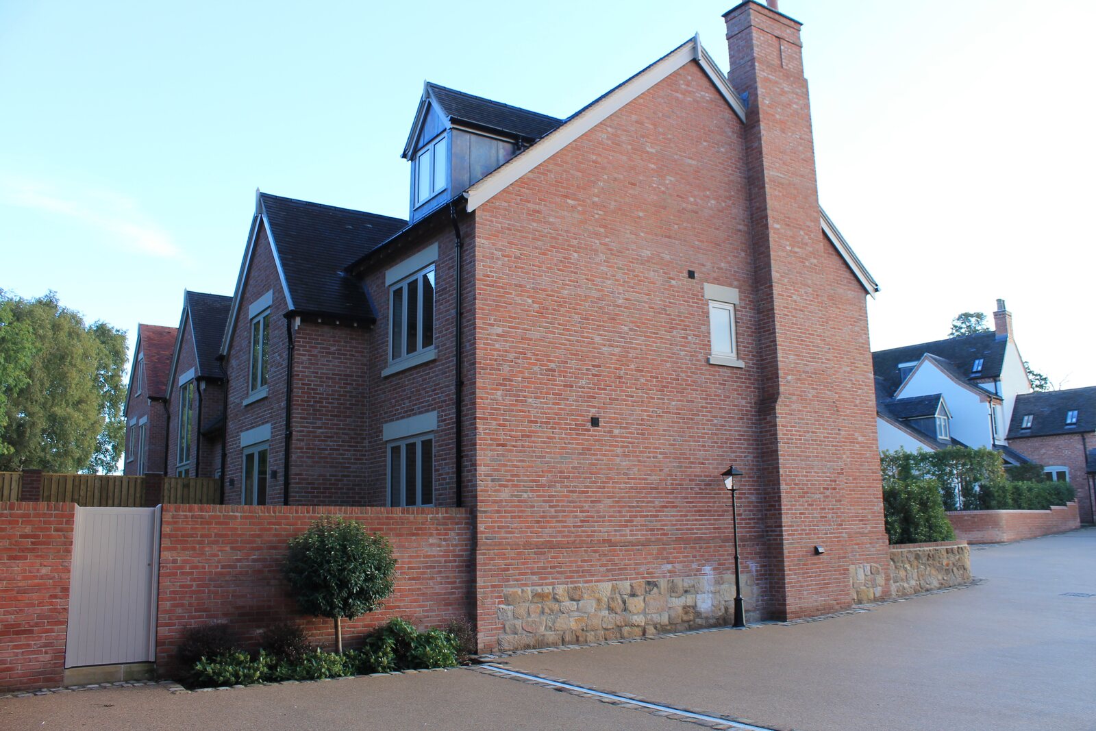 Completed homes showing the character and scale of an Armsgate site